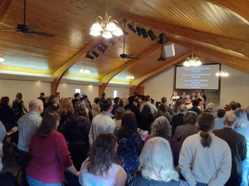 The congregation singing during a Sunday service